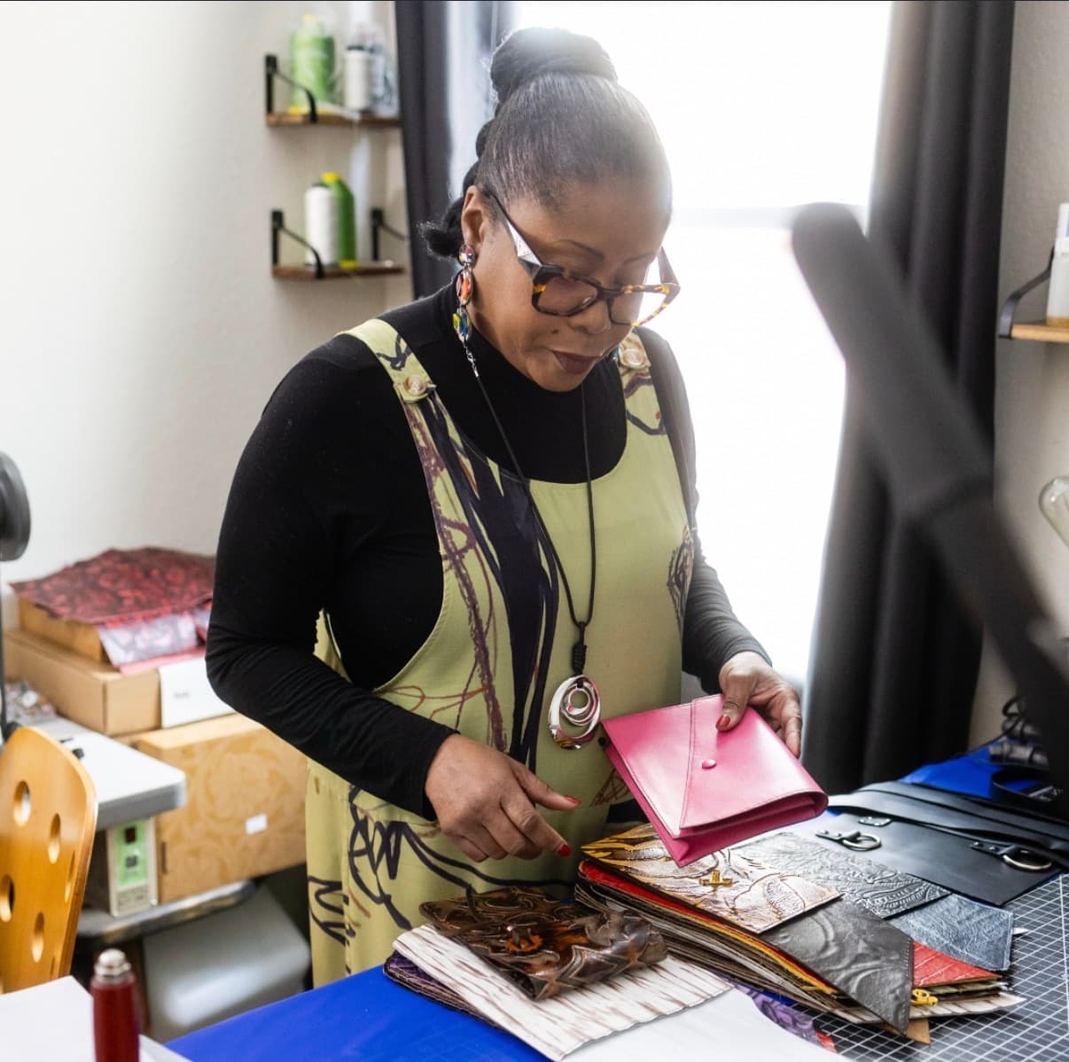 Marsha working on leather